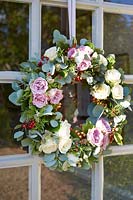 Front door with wreath of Roses and Eucalyptus foliage