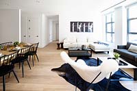 Monochrome open plan seating and dining areas