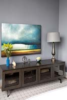 Wooden cabinet and landscape painting 