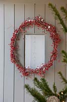 Berry wreath on front door