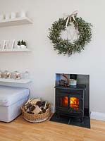 Mistletoe wreath above fireplace