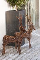 Deck with wicker reindeer decorations