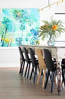 Modern chairs at dining table