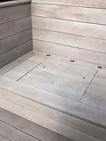 Fake wooden decking on roof terrace with hidden storage area