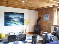 Landscape painting on living room wall by Catherine Knight