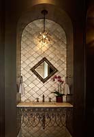 Bathroom sink in alcove
