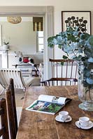 Vase of Eucalyptus foliage on kitchen table