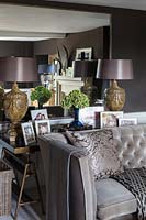 Accessories and photos on console table