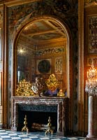 Christmas in the dining room with bust of Le Brun on mantlepiece, Vaux le Vicomte
