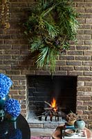 Wreath above fireplace