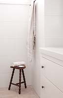 Wooden stool in shower