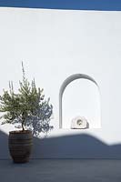 Whitewashed wall with alcove