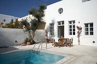Whitewashed house and swimming pool