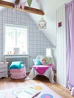 Colourful soft furnishings in nursery