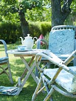 Teapot on garden table