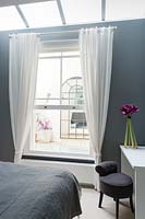 White curtains at bedroom window
