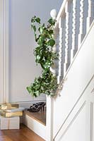 Ivy foliage wrapped around bannister