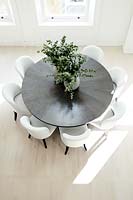Circular dining table