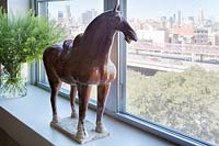 Horse sculpture on windowsill