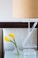 Calla lily flowers in glass vase