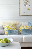 Patterned cushions on sofa