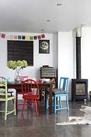 Colourful chairs in dining area