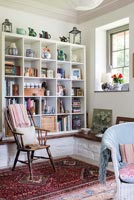 Traditional chair and modern bookcase