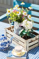 Floral decoration on garden table