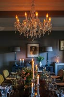 Chandelier by India Jane above dining table