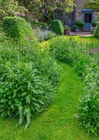 Grass path through garden