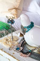 Jewellery on bedside table