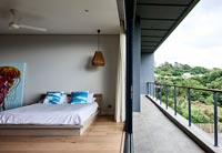 Minimal bedroom with balcony