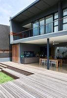 Contemporary house with covered dining area
