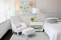 White armchair and footstool