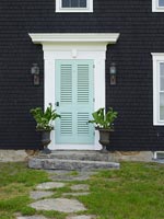 Front door with pot plants