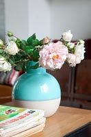 Vase of Roses on coffee table