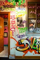 Hallway decorated with graffiti