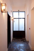 Corridor with wall mounted lamps