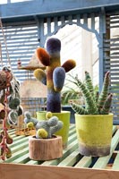 Colourful knitted cactus ornaments