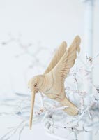 Bird bauble on christmas tree