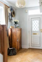 Wooden cupboard in hall