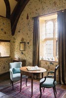 The Great chamber with handpainted floral wall design by Arabella Arkwright - Cothay Manor
