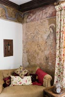 Ribbon frieze pattern and wall painting depicting the Annunciation - Cothay Manor