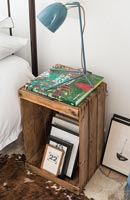 Crate used as bedside table