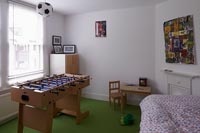 Childs bedroom with football table