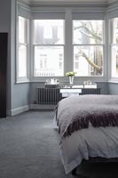 Grey carpet on bedroom floor