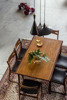 Open plan dining area with teak furniture
