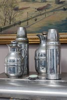 1930s and 1940s polished steel thermos and jugs