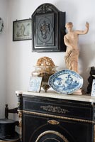 Shellac cabinet, Doulton Lambeth terracotta statue  and Pier cabinet with Boulle gilded insets and marble top 