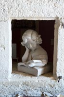 Sculpture in alcove